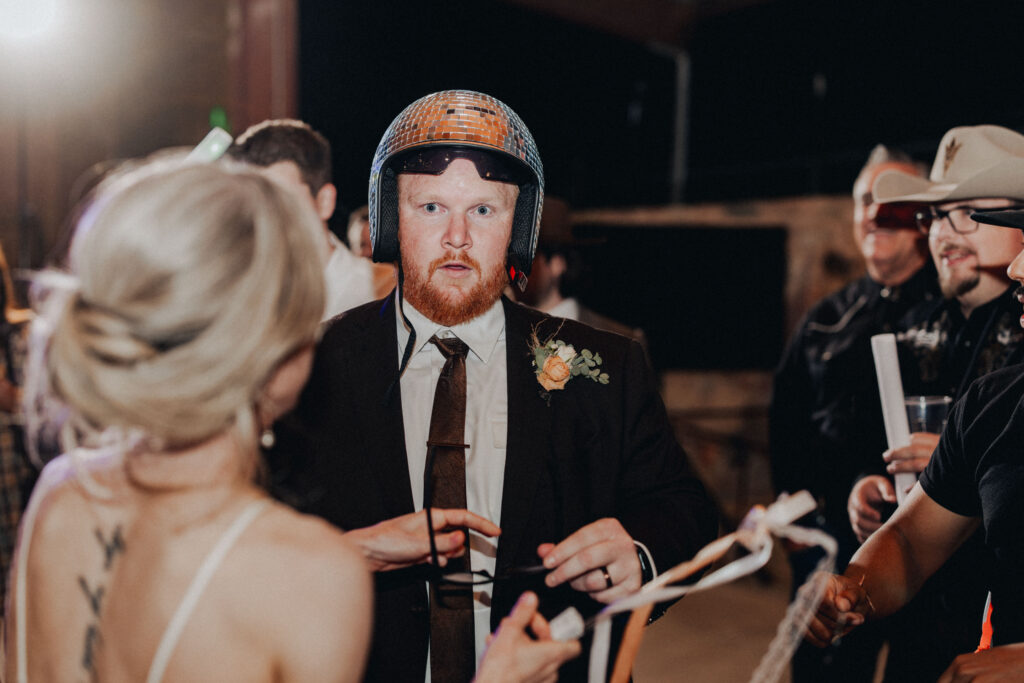 Guests dancing during western Arizona ranch wedding reception”